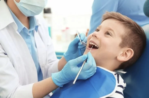 kid at the dentist
